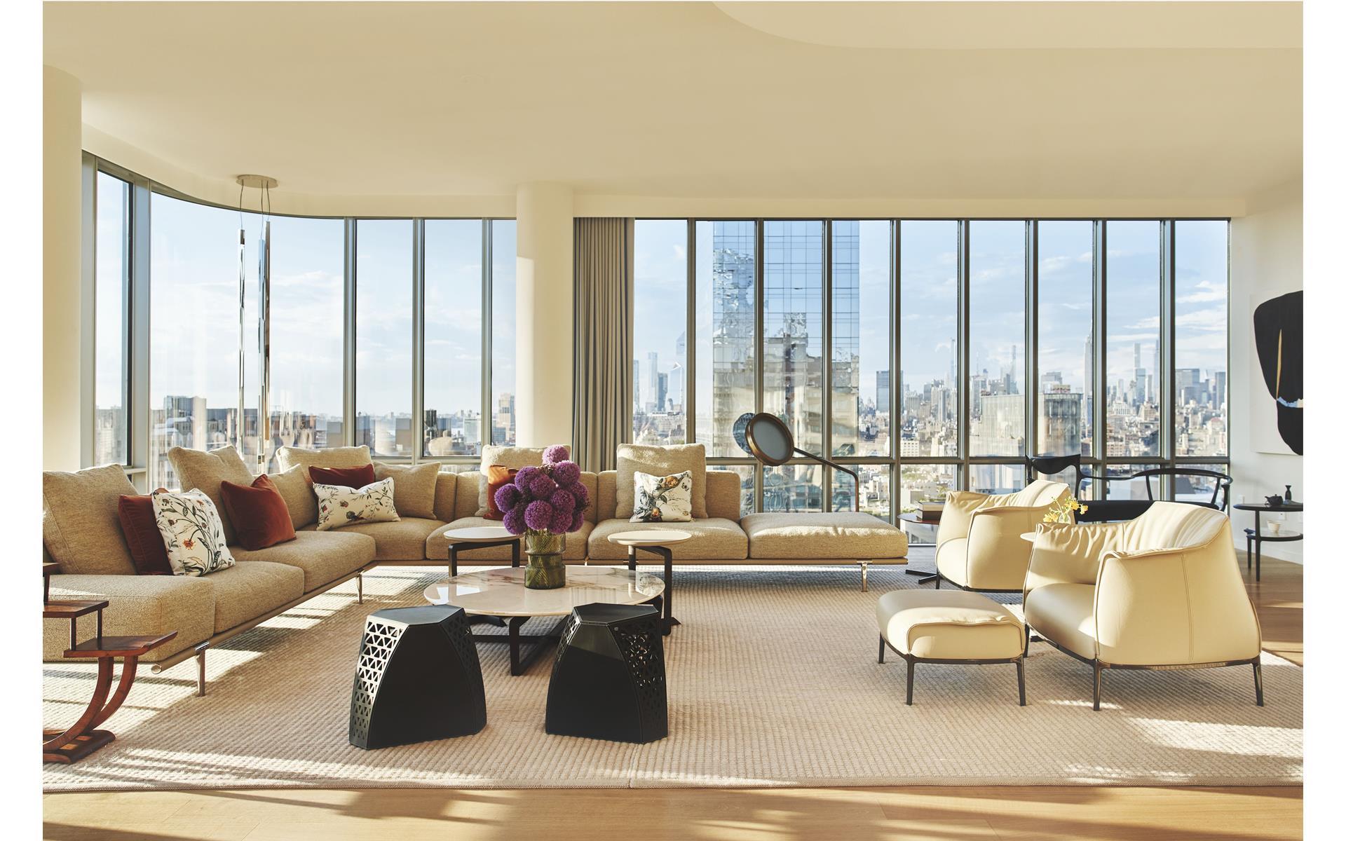 565 Broome Street, Unit S28A Manhattan, NY 10013 - Photo 2 of 36 a living room with furniture and large windows
