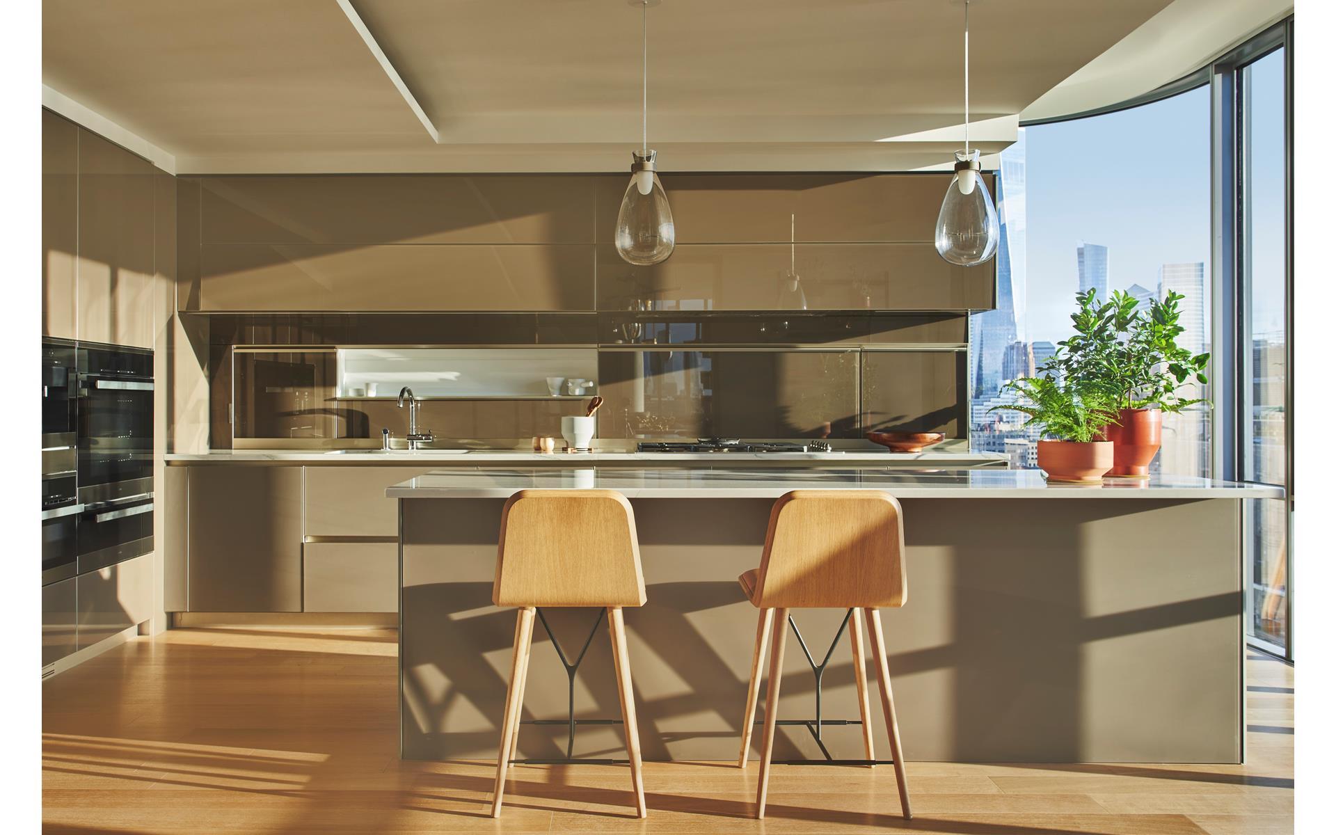565 Broome Street, Unit S28A Manhattan, NY 10013 - Photo 3 of 36 a kitchen with a table and chairs in it