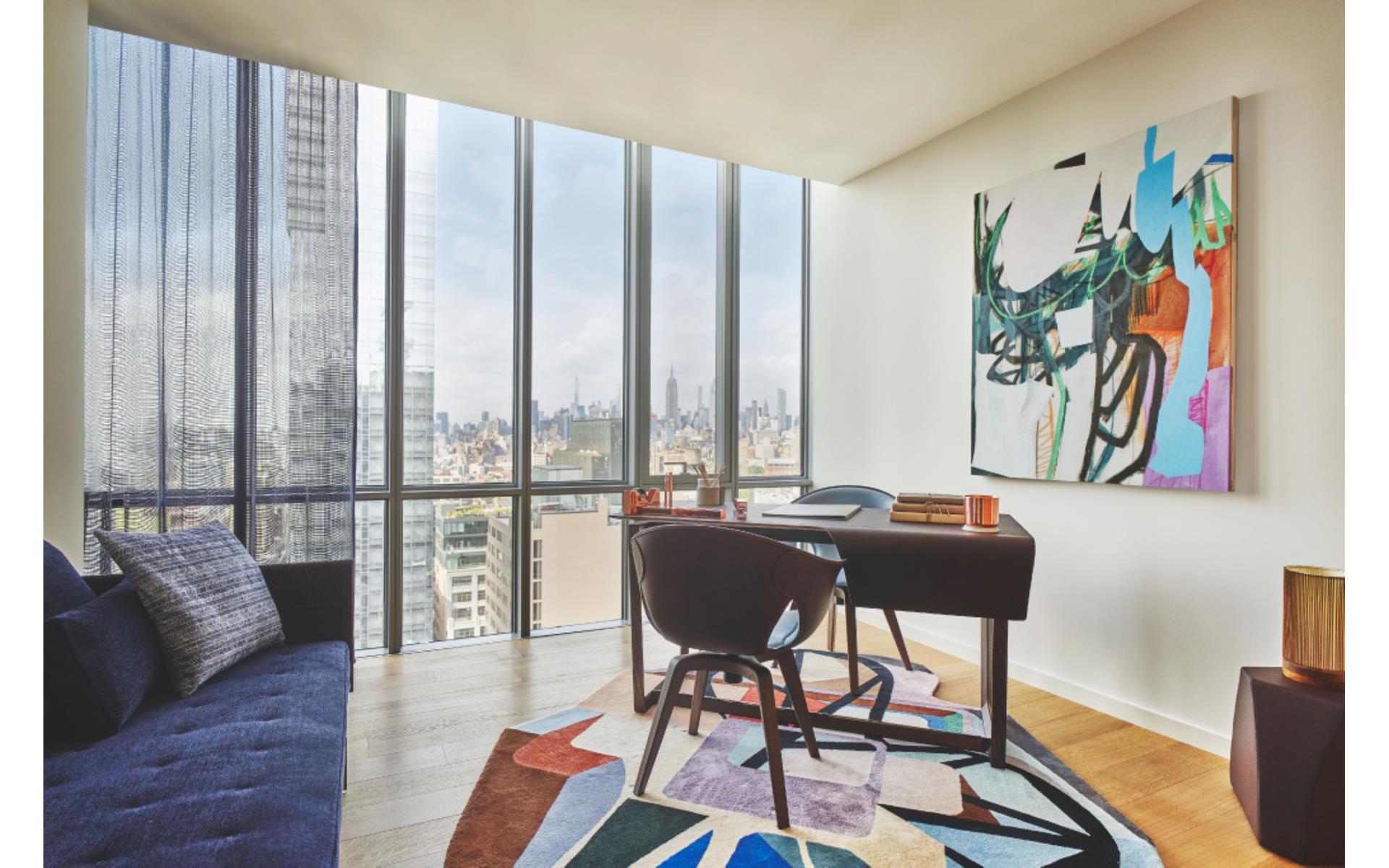 565 Broome Street, Unit S28A Manhattan, NY 10013 - Photo 9 of 36 a view of a livingroom with furniture and rug