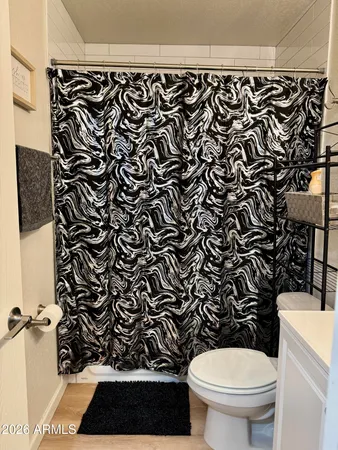 a bedroom with a bed and closet