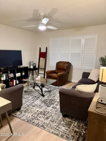 a bathroom with a black white checkered floor