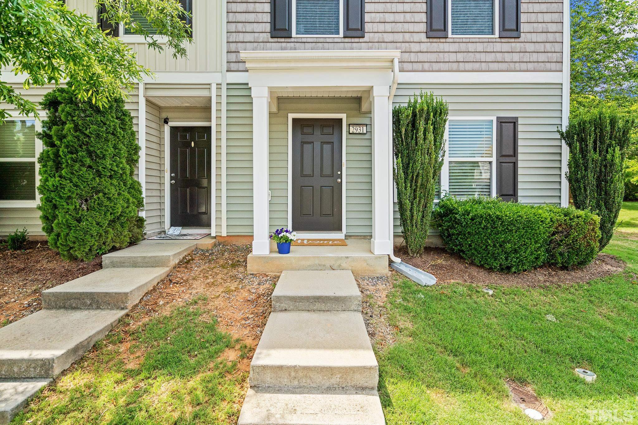 2931 Berkeley Springs Place Raleigh, NC 27616 - Photo 28 of 32 a front view of a house with a yard