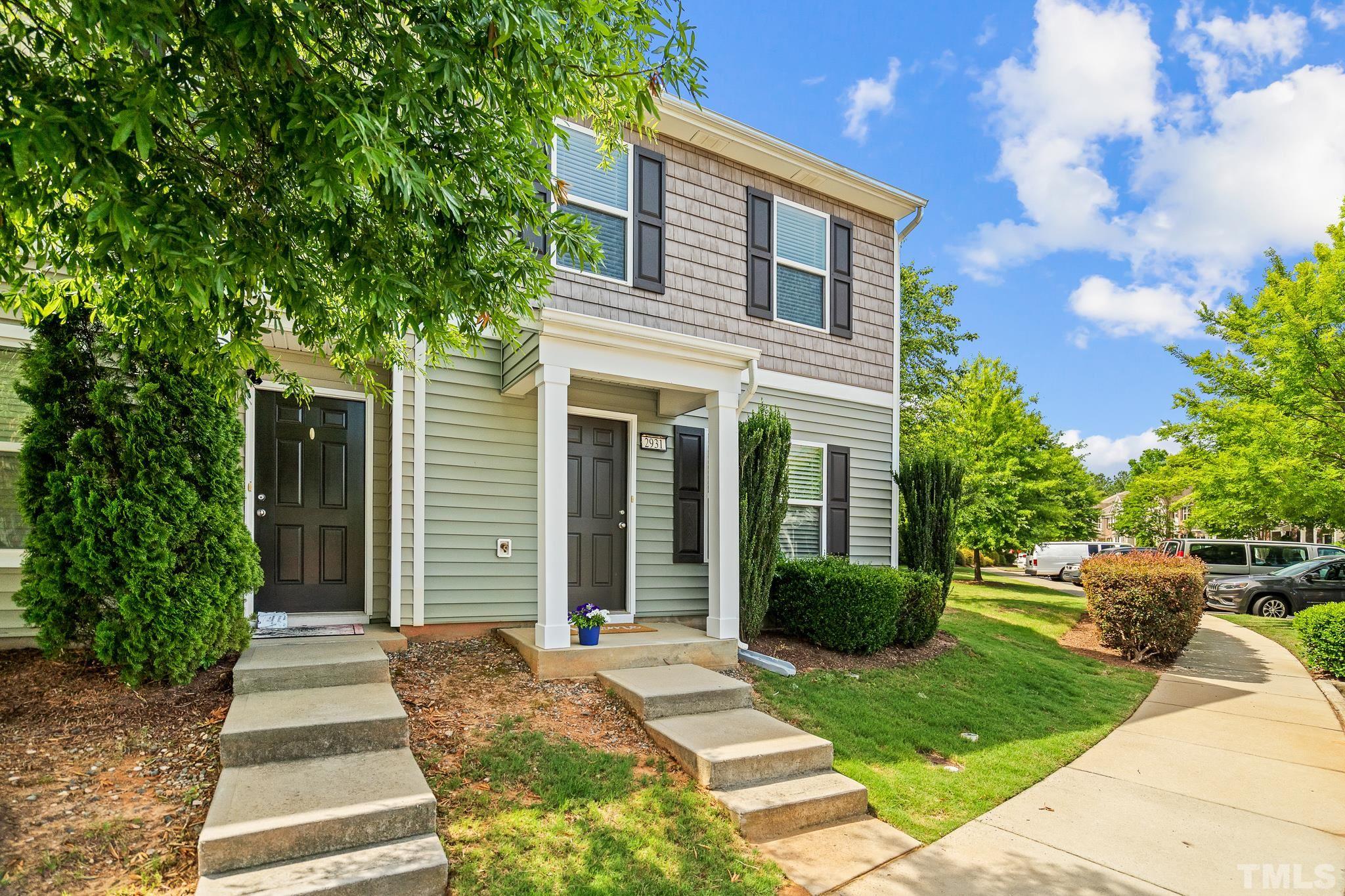 2931 Berkeley Springs Place Raleigh, NC 27616 - Photo 29 of 32 a front view of a house with garden