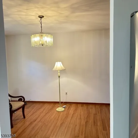 a view of a room with a chandelier