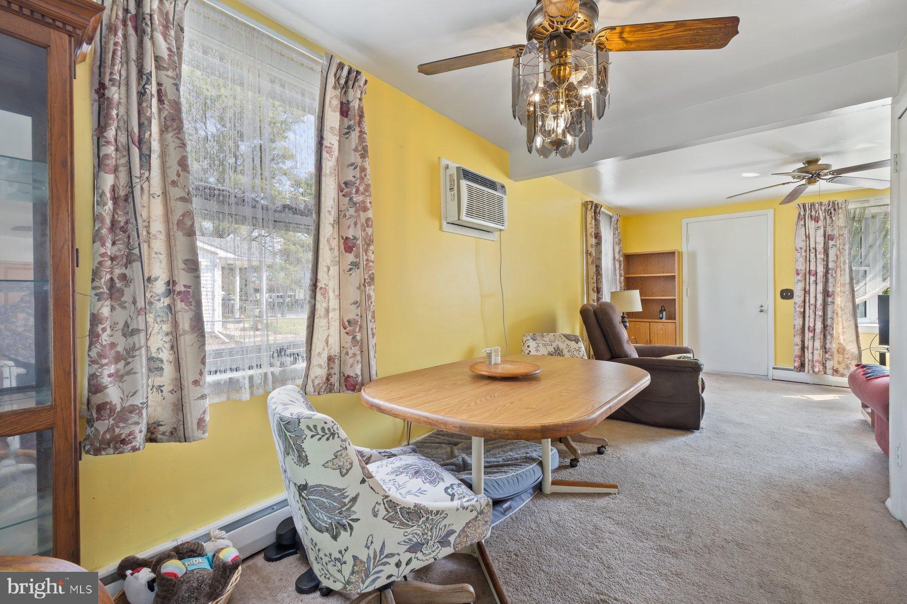 488 Bruce Avenue Odenton, MD 21113 - Photo 11 of 54 a living room with furniture and a chandelier