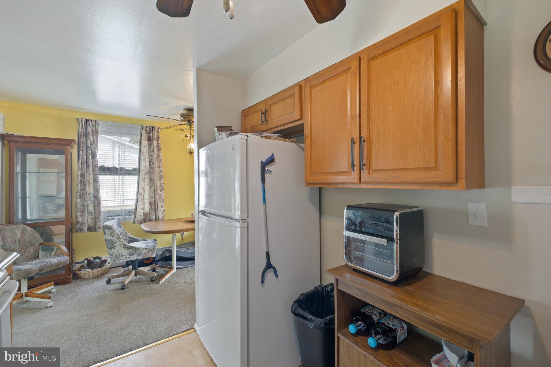 488 Bruce Avenue Odenton, MD 21113 - Photo 15 of 54 a kitchen with stainless steel appliances granite countertop a refrigerator and a stove top oven