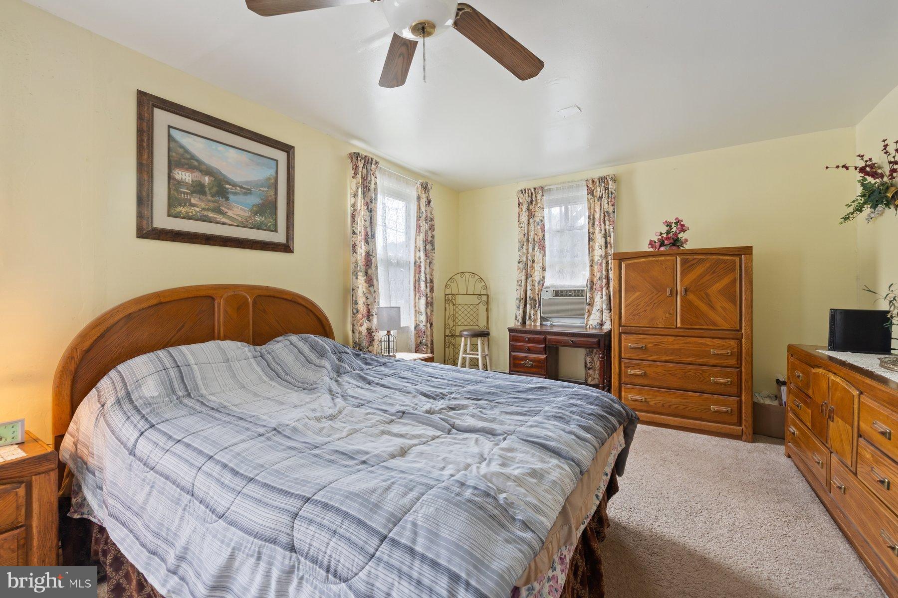 488 Bruce Avenue Odenton, MD 21113 - Photo 21 of 54 a bedroom with a bed and furniture