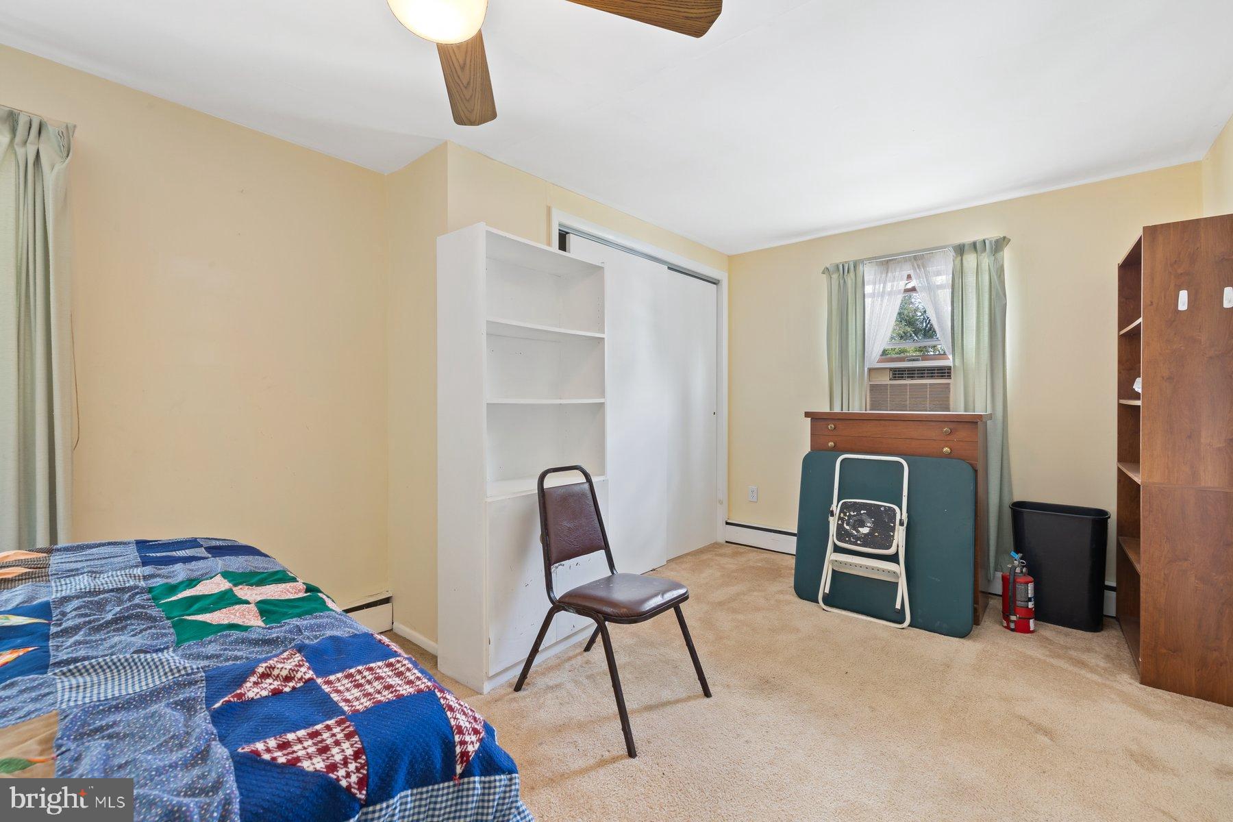 488 Bruce Avenue Odenton, MD 21113 - Photo 24 of 54 a bedroom with a bed and a chair