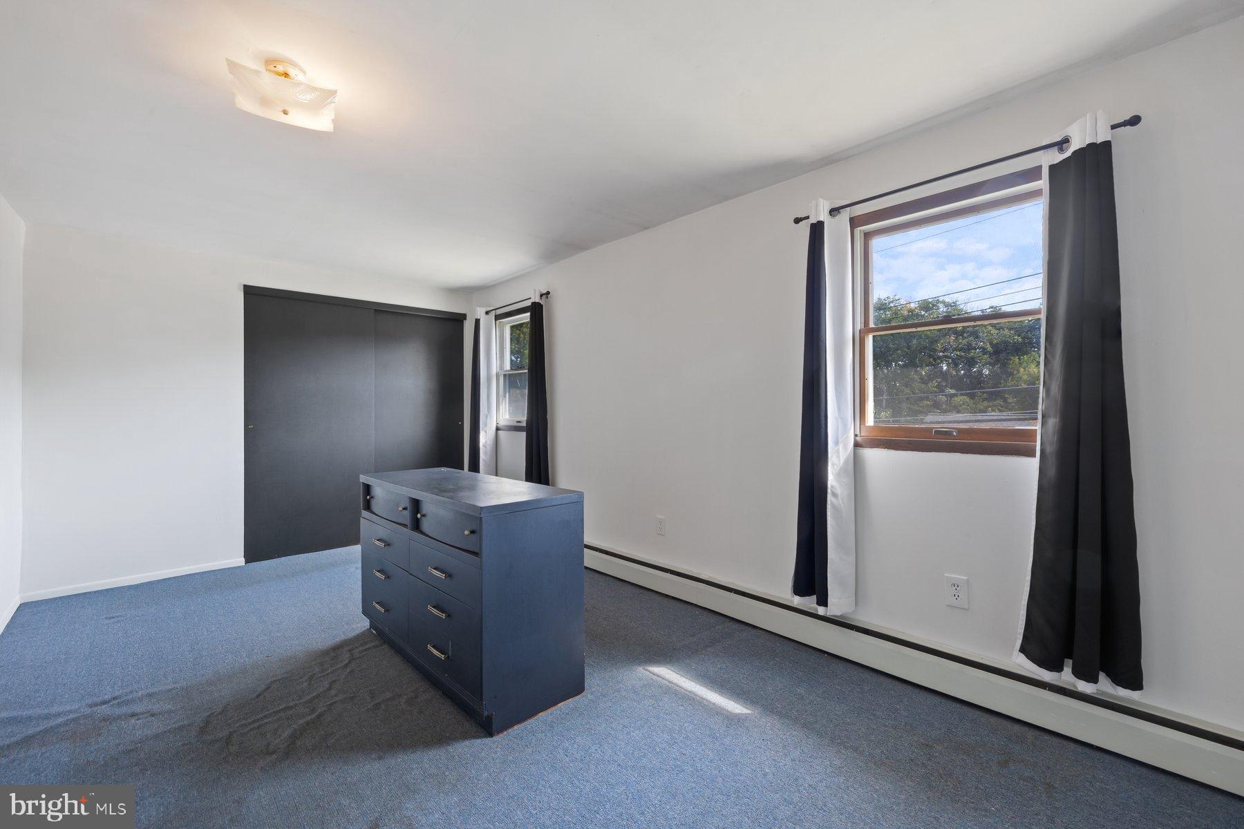488 Bruce Avenue Odenton, MD 21113 - Photo 27 of 54 an empty room with windows and closet