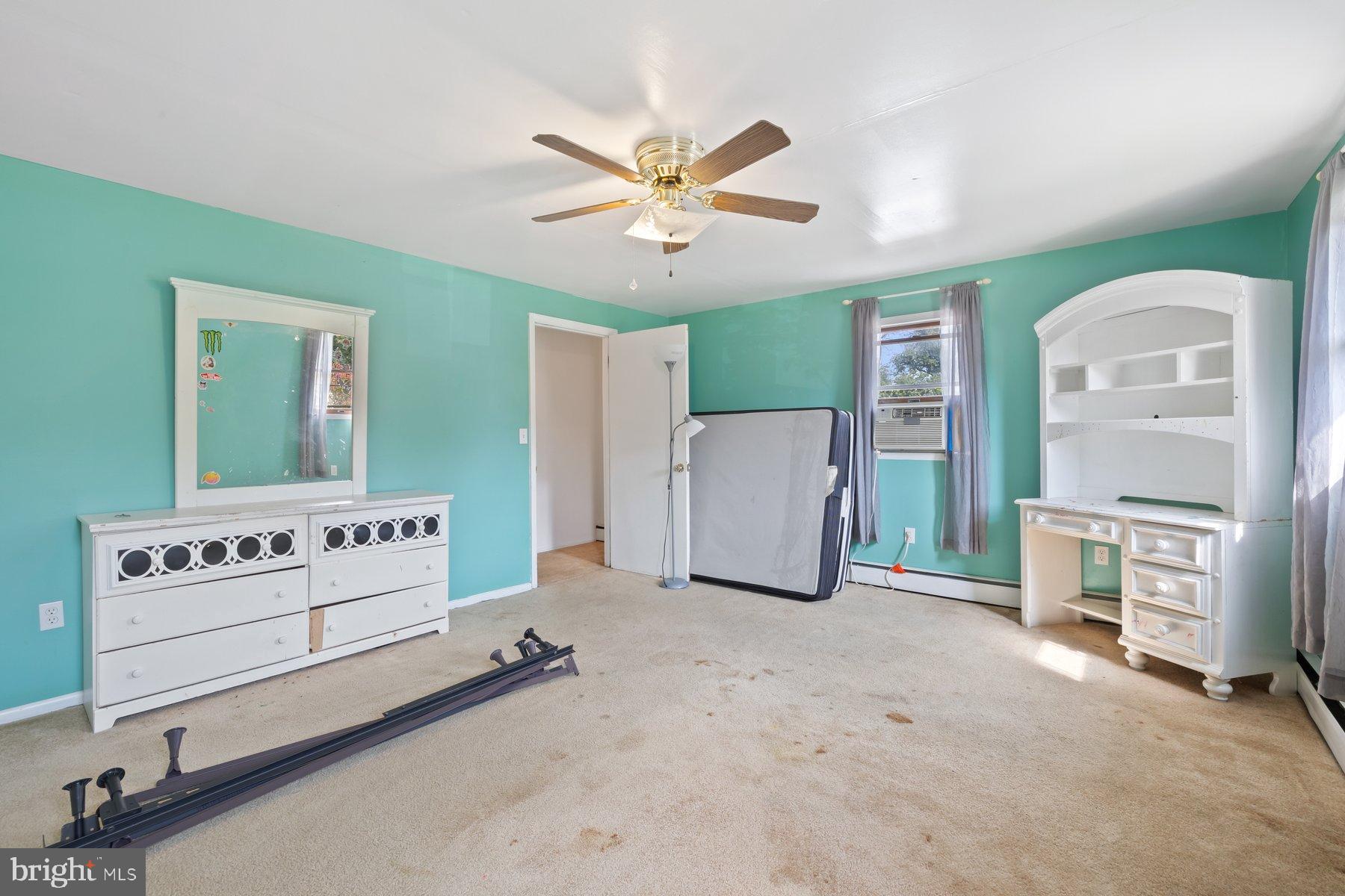 488 Bruce Avenue Odenton, MD 21113 - Photo 31 of 54 a view of a livingroom with furniture and a ceiling fan