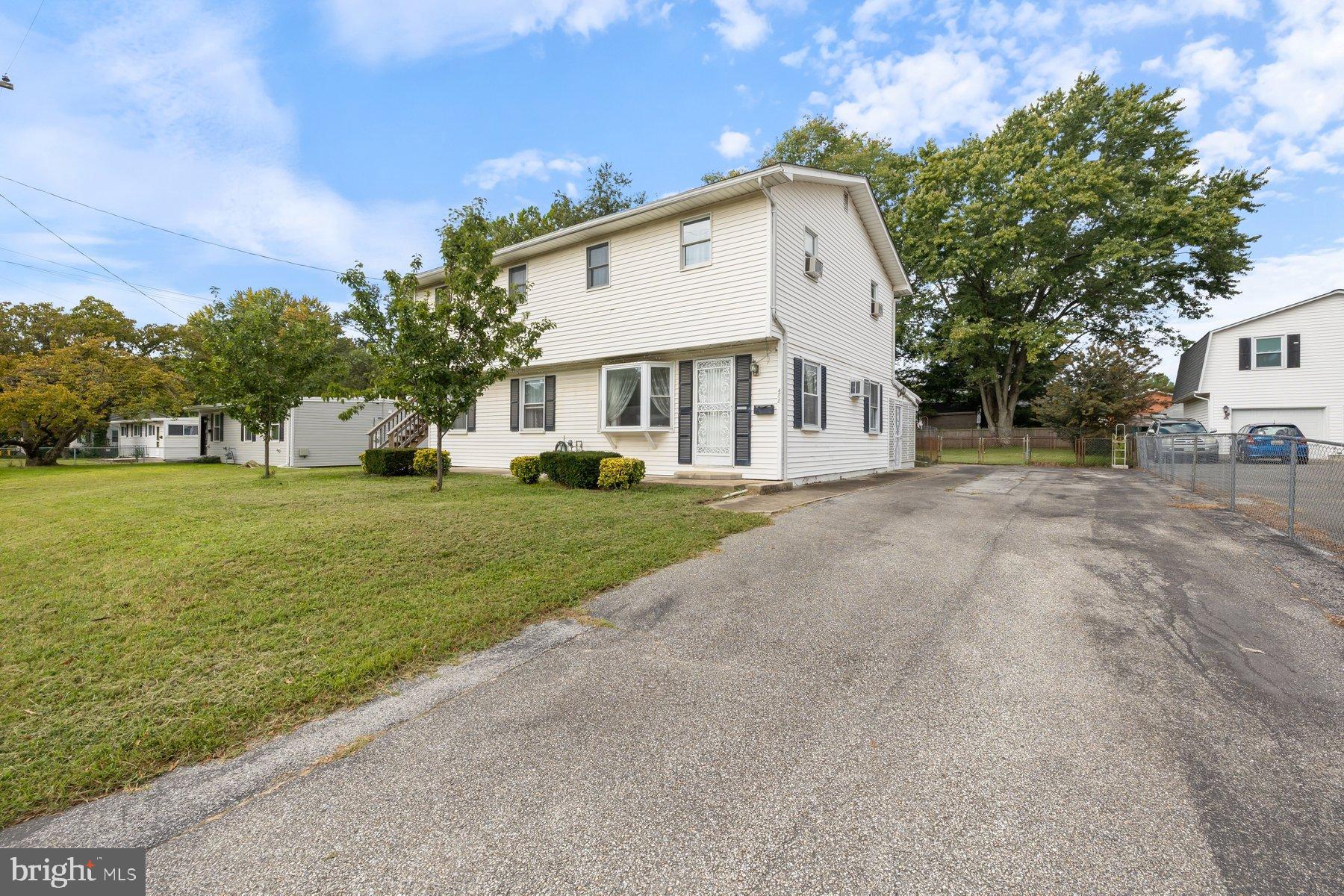 488 Bruce Avenue Odenton, MD 21113 - Photo 6 of 54 a view of a house with a yard