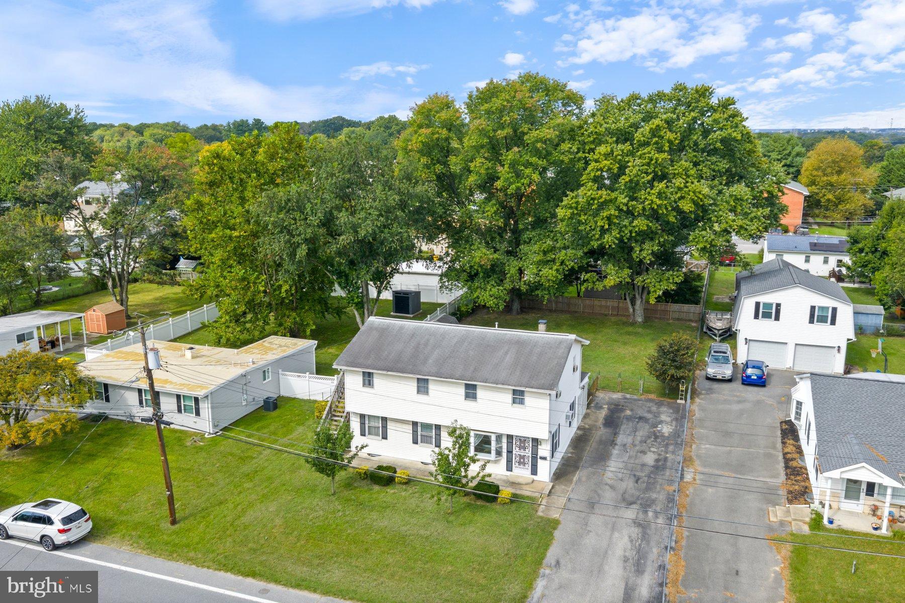 488 Bruce Avenue Odenton, MD 21113 - Photo 7 of 54 an aerial view of a house with a garden