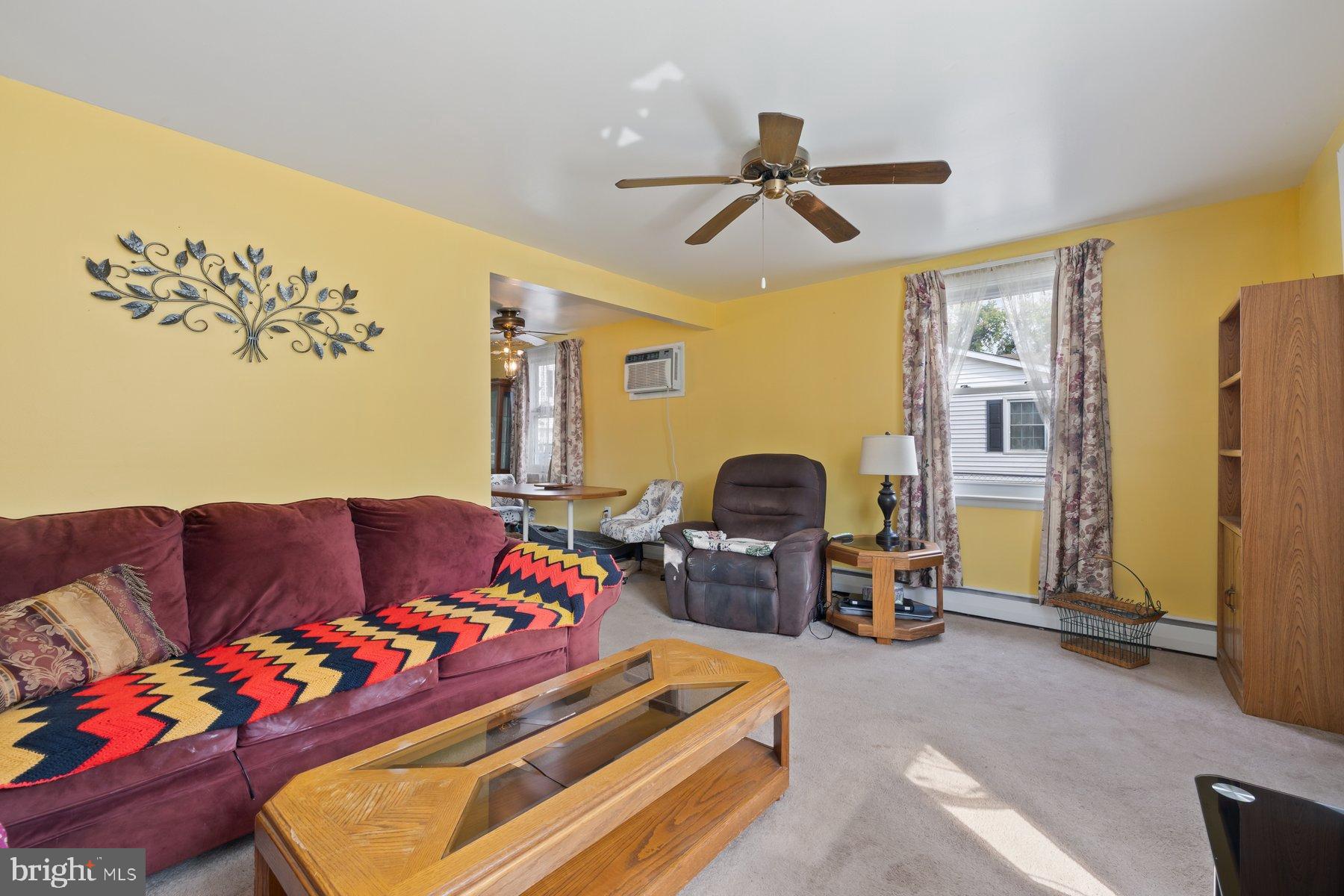 488 Bruce Avenue Odenton, MD 21113 - Photo 9 of 54 a living room with furniture and a couch