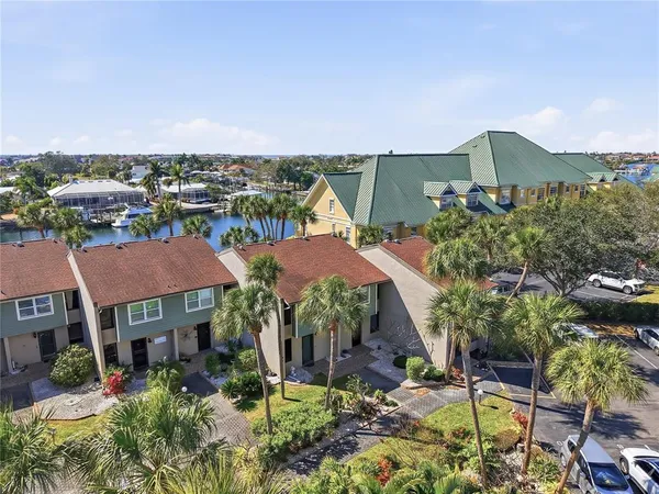 a view of houses with an outdoor space and lakeside