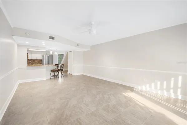 a view of dining room with furniture and a table