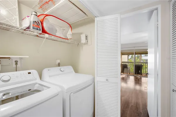 a utility room with dryer and washer