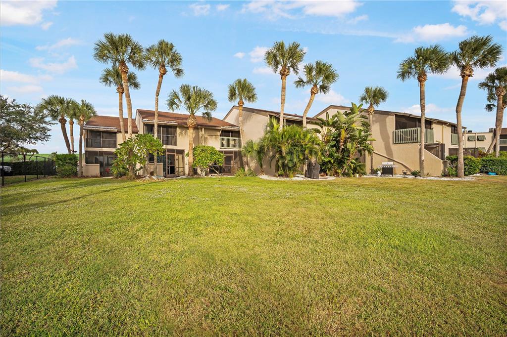 1028 Apollo Beach Boulevard, Unit 17 Apollo Beach, FL 33572 - Photo 20 of 27 a view of a palm trees in front of a building