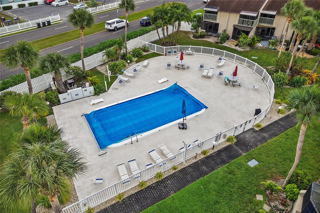 1028 Apollo Beach Boulevard, Unit 17 Apollo Beach, FL 33572 - Photo 23 of 27 an aerial view of a house with a garden and swimming pool