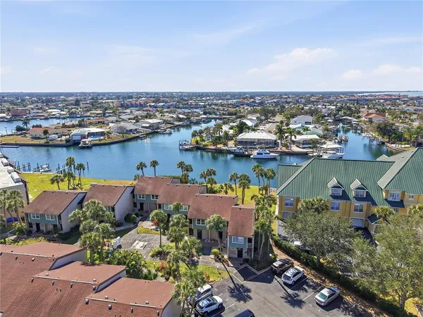 an aerial view of a houses with yard