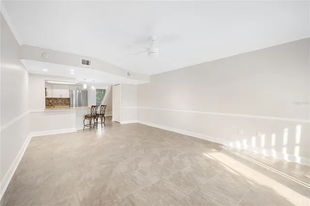 a view of dining room with furniture and a table