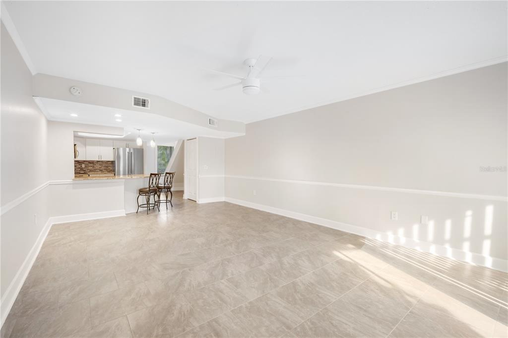 1028 Apollo Beach Boulevard, Unit 17 Apollo Beach, FL 33572 - Photo 10 of 27 a view of dining room with furniture and a table
