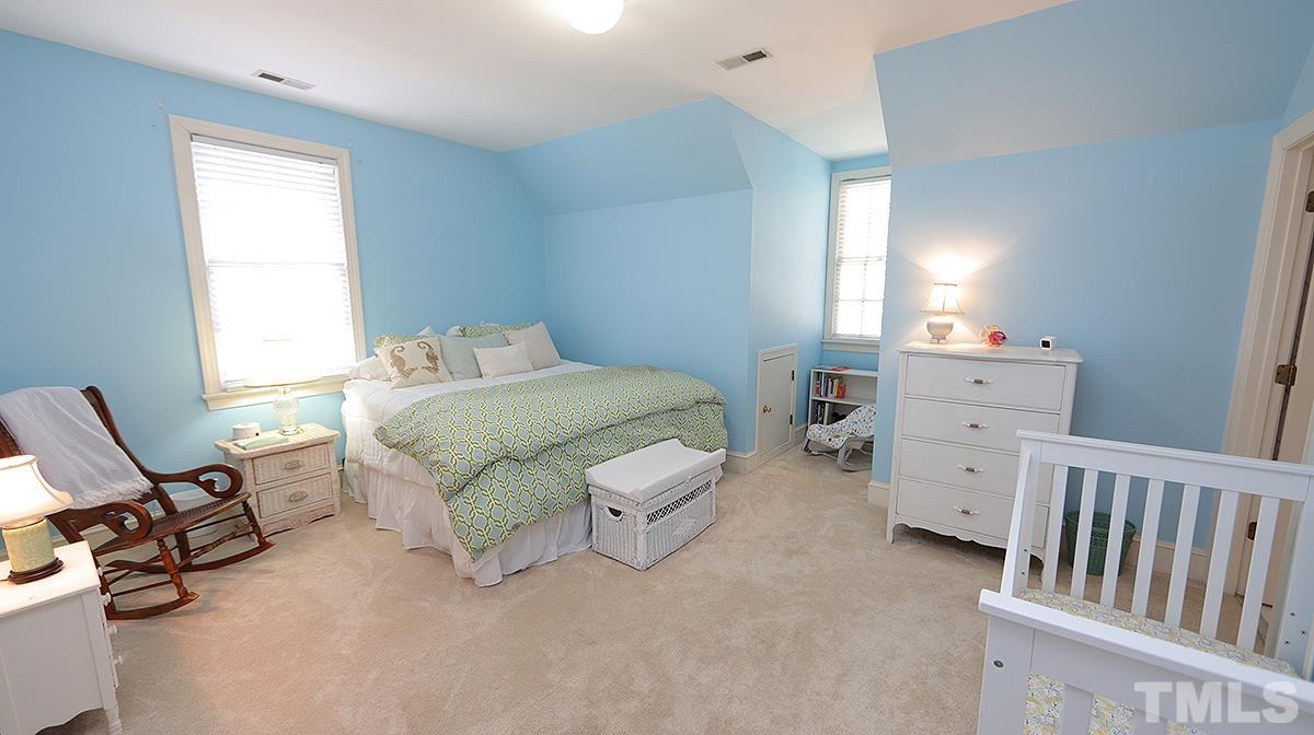 321 Marlowe Road Raleigh, NC 27609 - Photo 14 of 21 a bedroom with a bed and a window