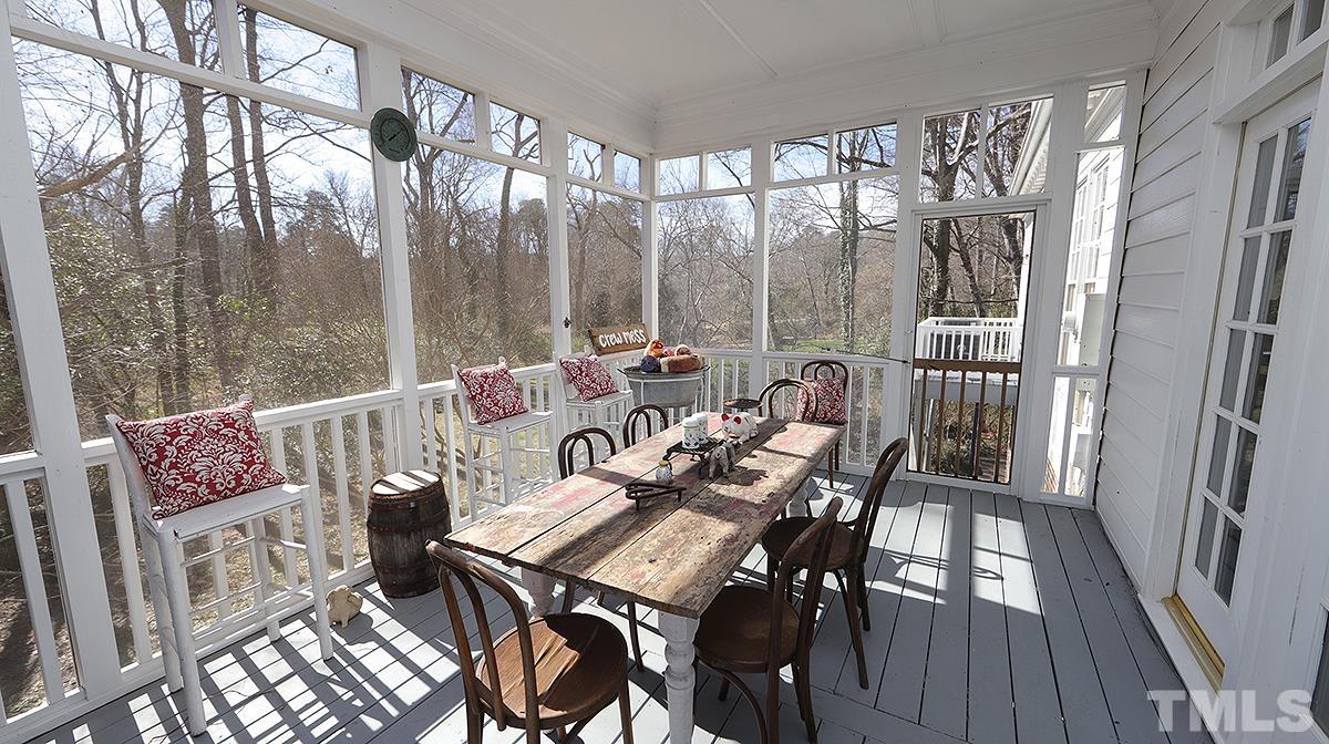 321 Marlowe Road Raleigh, NC 27609 - Photo 18 of 21 a view of a balcony with furniture and wooden floor
