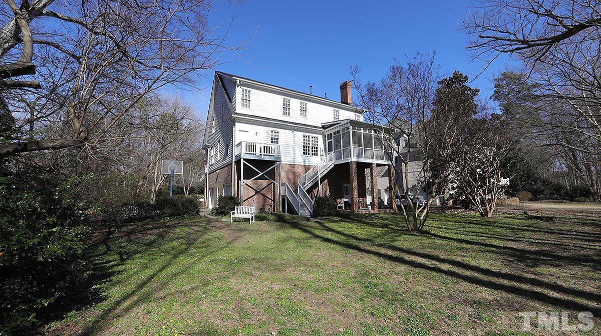 321 Marlowe Road Raleigh, NC 27609 - Photo 20 of 21 a view of a house with backyard and trees