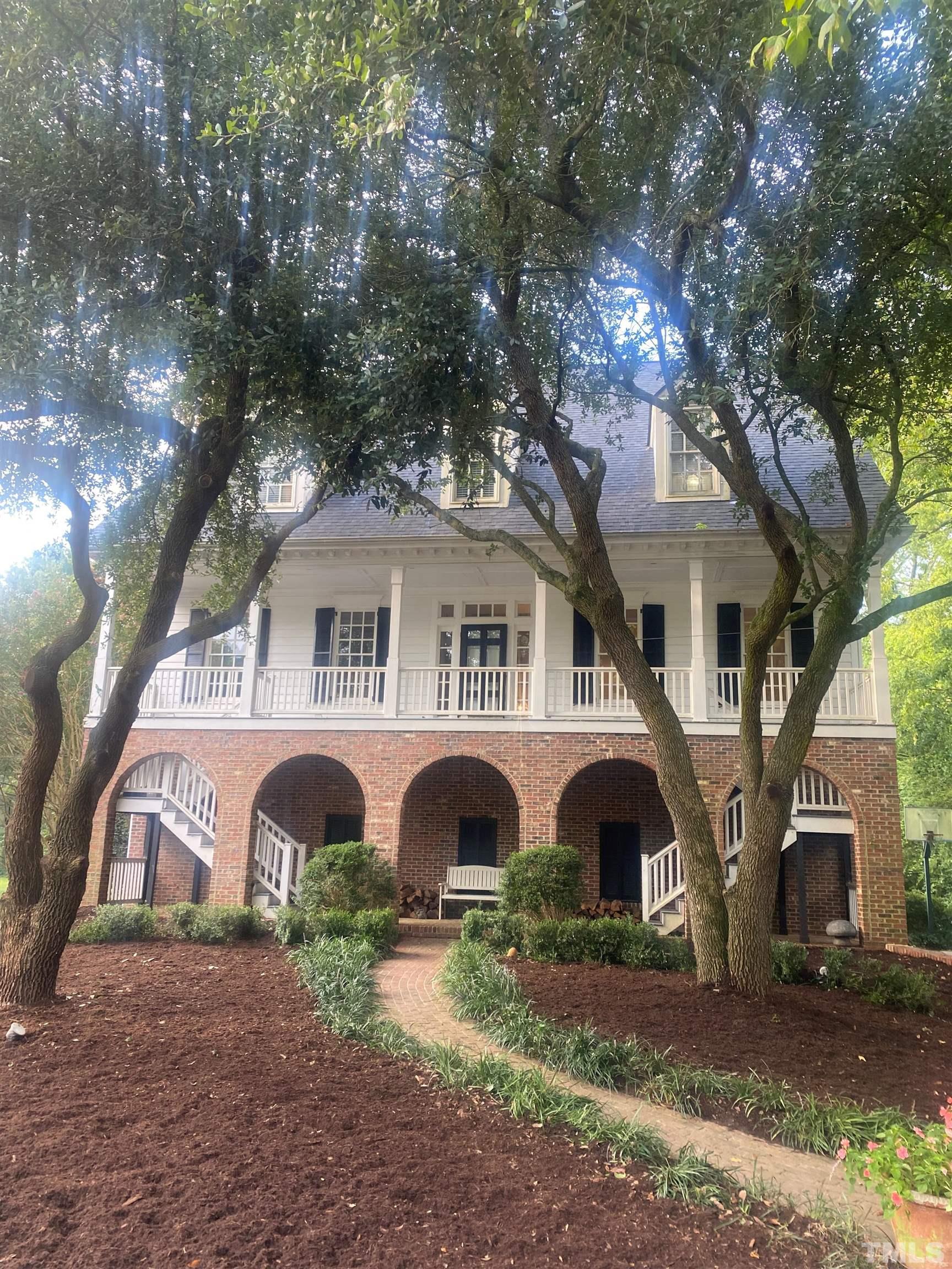 321 Marlowe Road Raleigh, NC 27609 - Photo 21 of 21 a front view of a house with garden