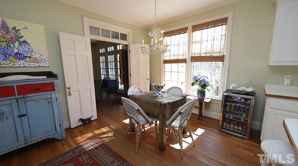 321 Marlowe Road Raleigh, NC 27609 - Photo 7 of 21 a view of a workspace with furniture and a window