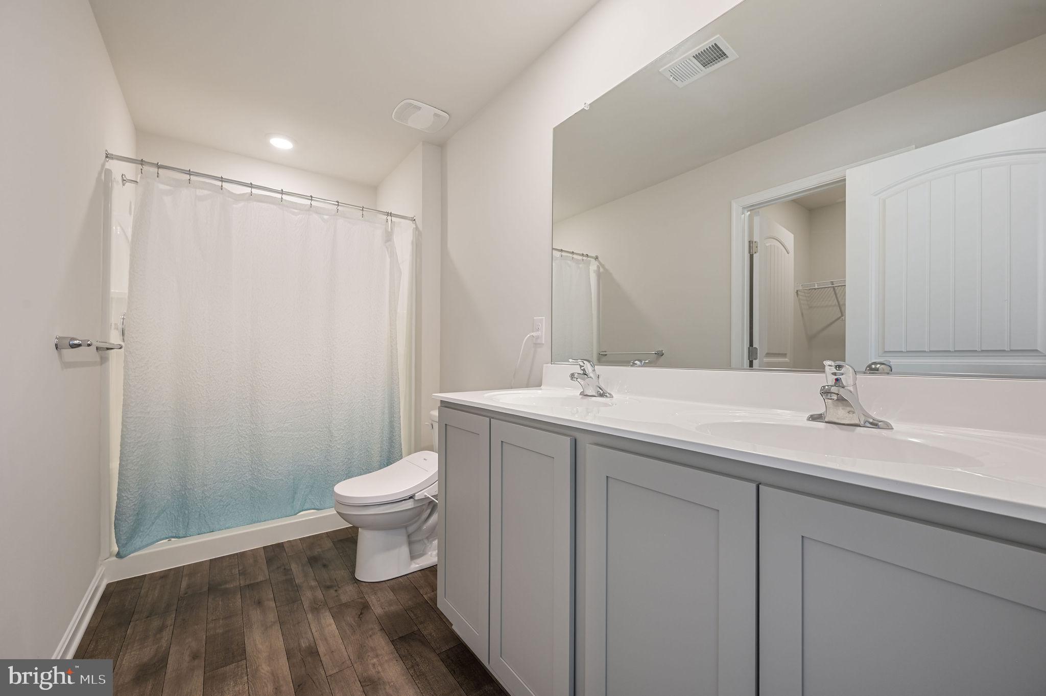 338 Currant Circle Magnolia, DE 19962 - Photo 21 of 27 Primary bath with walk in closet