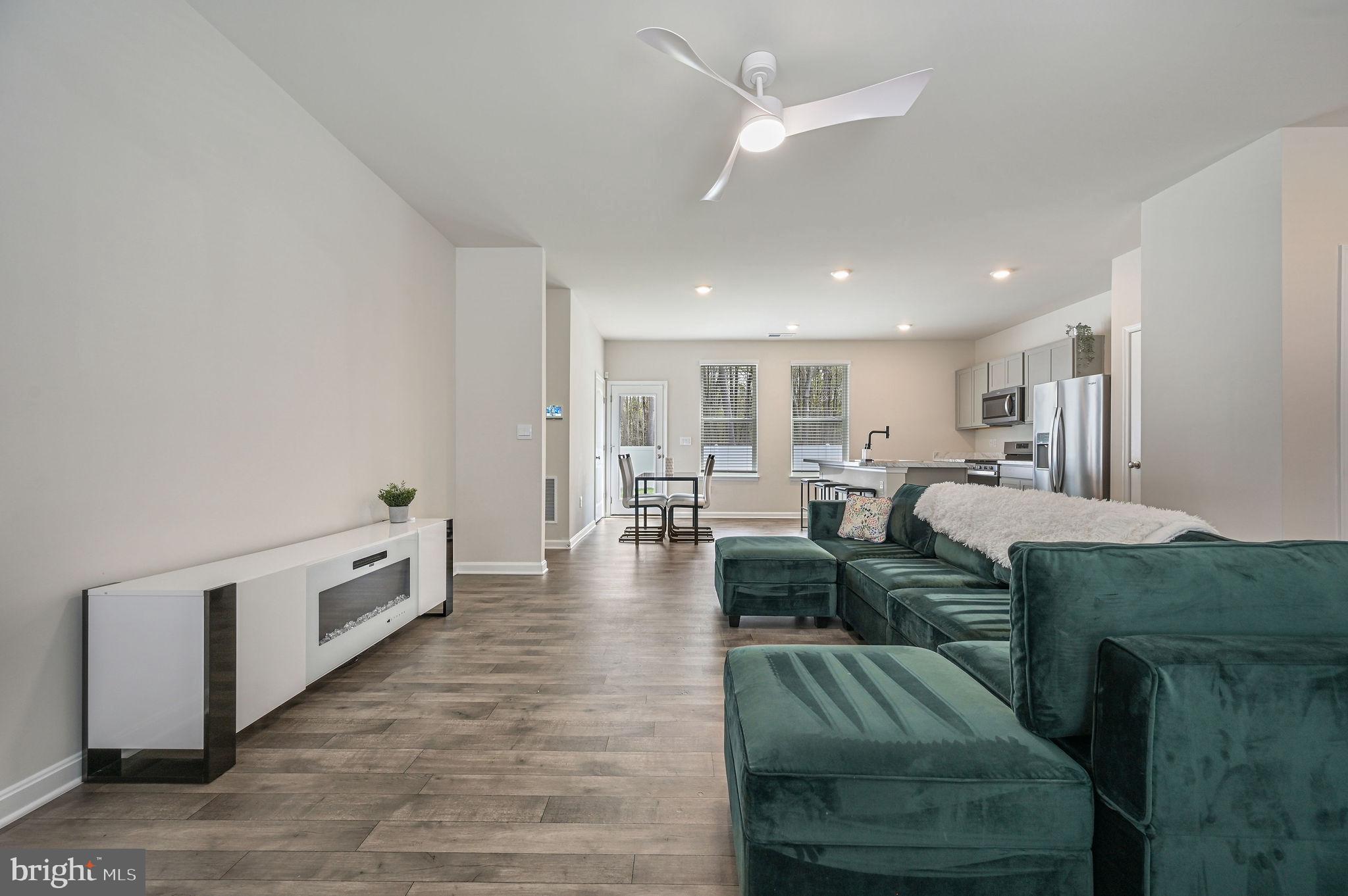 338 Currant Circle Magnolia, DE 19962 - Photo 7 of 27 Living room facing dining area