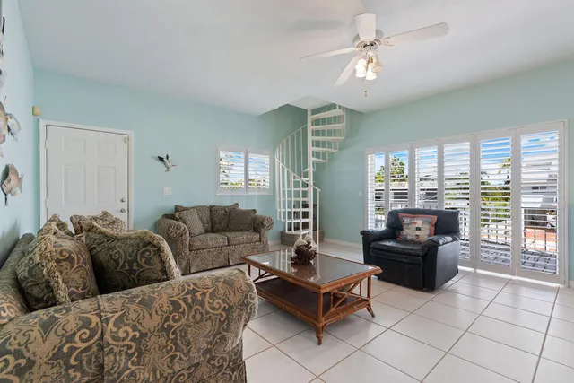 a kitchen with furniture and window