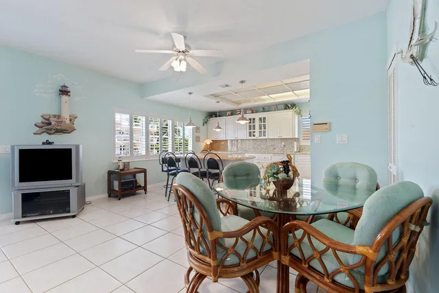 a bedroom with a bed chair and window