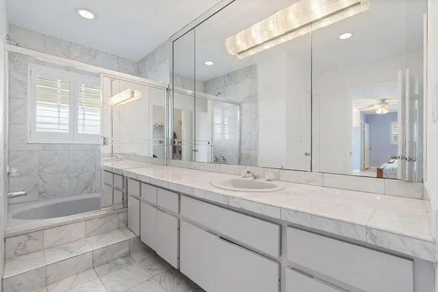 a view of balcony with furniture