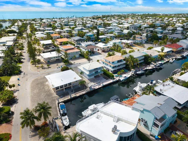 a house with river in front of it
