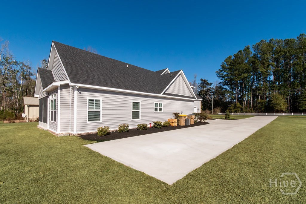 1355 Old Louisville Road Guyton, GA 31312 - Photo 39 of 43 Additional Concrete driveway space