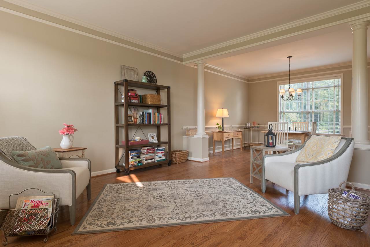5383 Windy Ridge Road Charlottesville, VA 22903 - Photo 3 of 19 a living room with furniture and a wooden floor