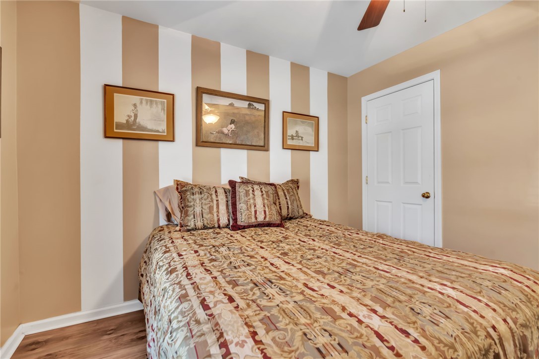 18 Sweetgrass Trail Anderson, SC 29625 - Photo 17 of 26 This cozy bedroom features warm tones, inviting textures, and ample natural light, creating a comfortable retreat.