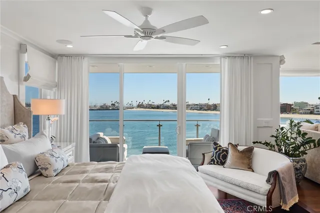 a bathroom with a sink and mirror with bathtub