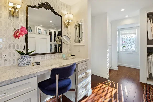 a spacious bathroom with a tub shower and sink