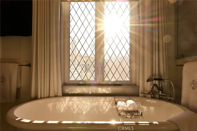 a workspace with furniture and flat screen tv