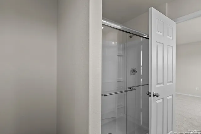 a view of an empty room and closet