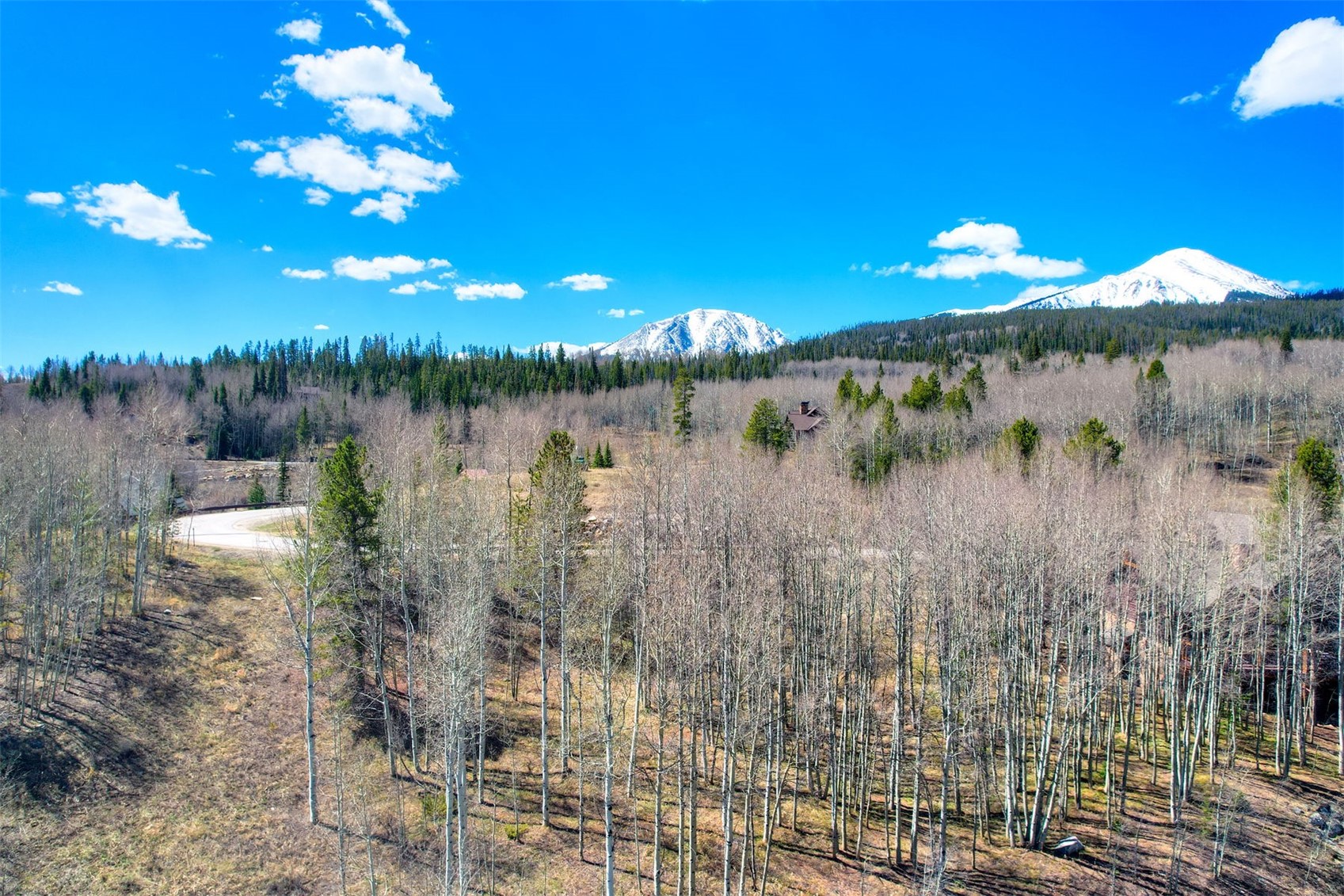 2180 Currant Way Silverthorne, CO 80498 - Photo 12 of 32 a view of a lake with a yard
