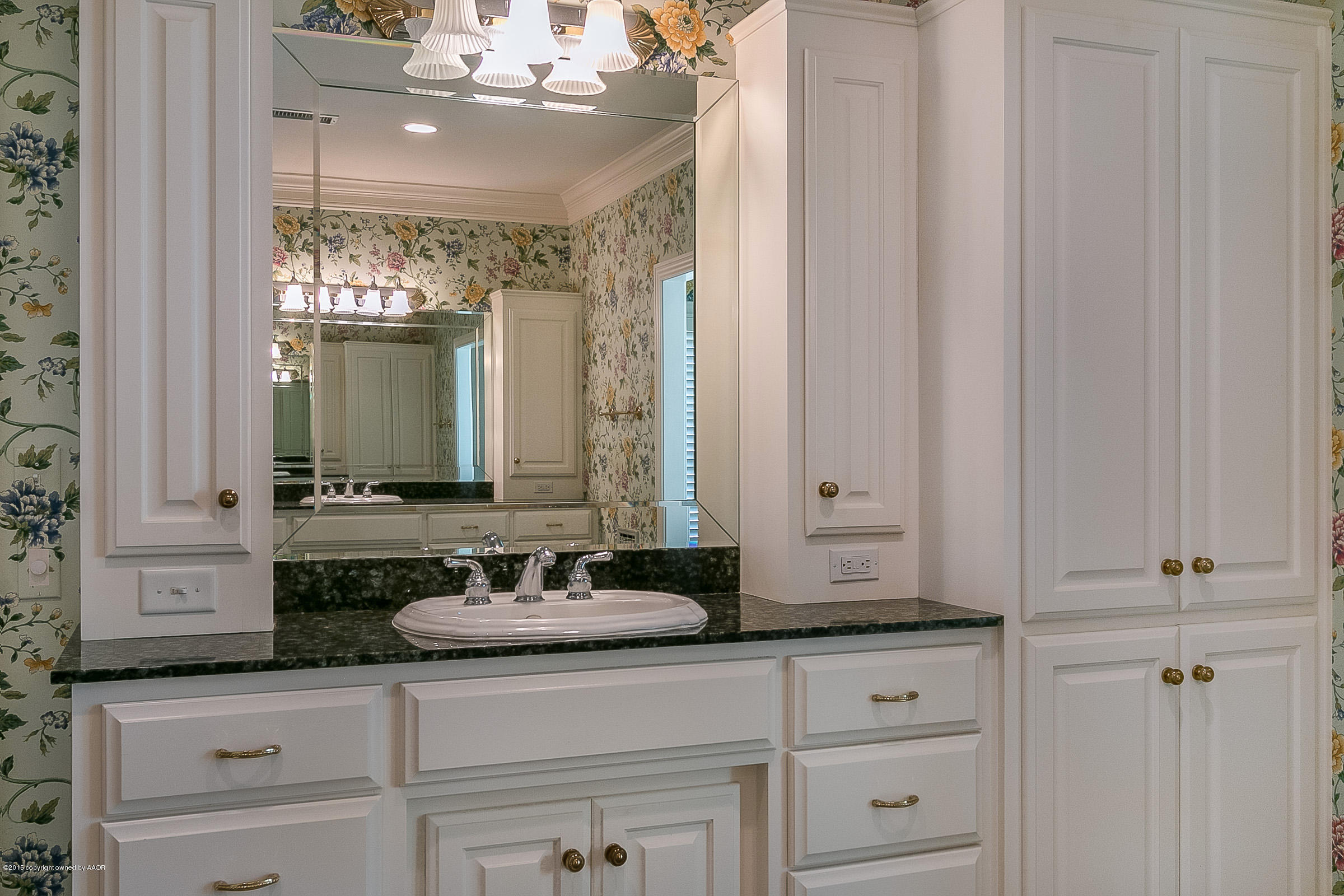 9101 Red Wing Road Amarillo, TX 79119 - Photo 58 of 70 a bathroom with a double vanity sink and a mirror