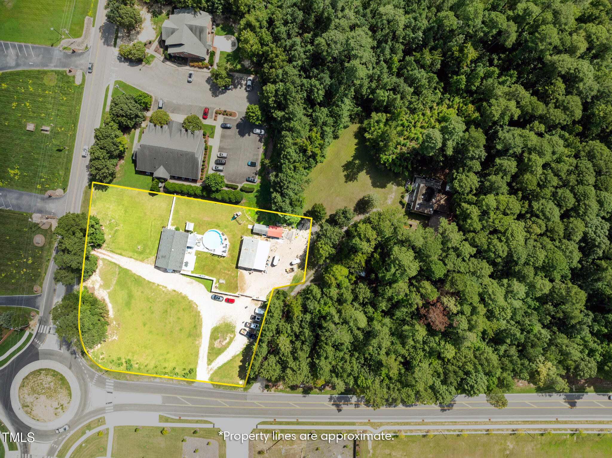 949 Old Knight Road Knightdale, NC 27545 - Photo 1 of 27 an aerial view of a house with a swimming pool