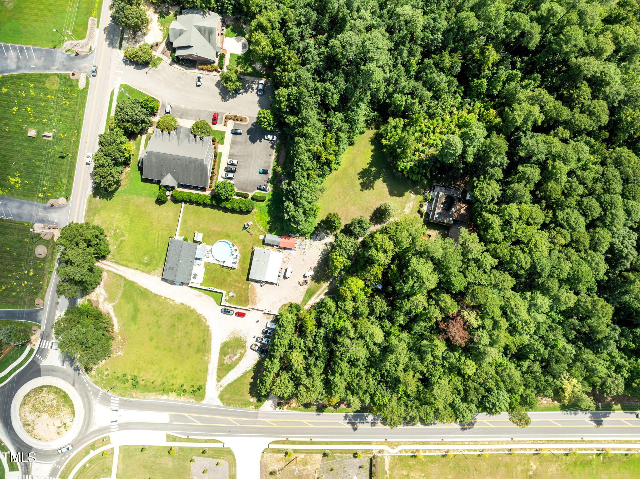 949 Old Knight Road Knightdale, NC 27545 - Photo 15 of 27 an aerial view of a house with a yard and swimming pool