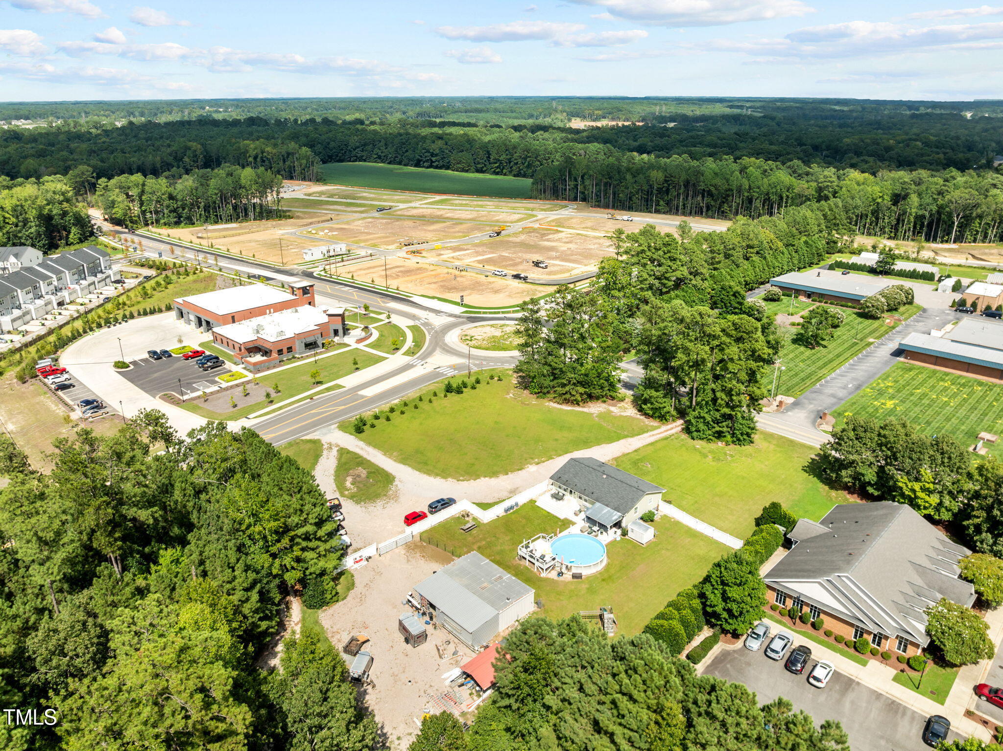 949 Old Knight Road Knightdale, NC 27545 - Photo 17 of 27 a view of swimming pool with a garden