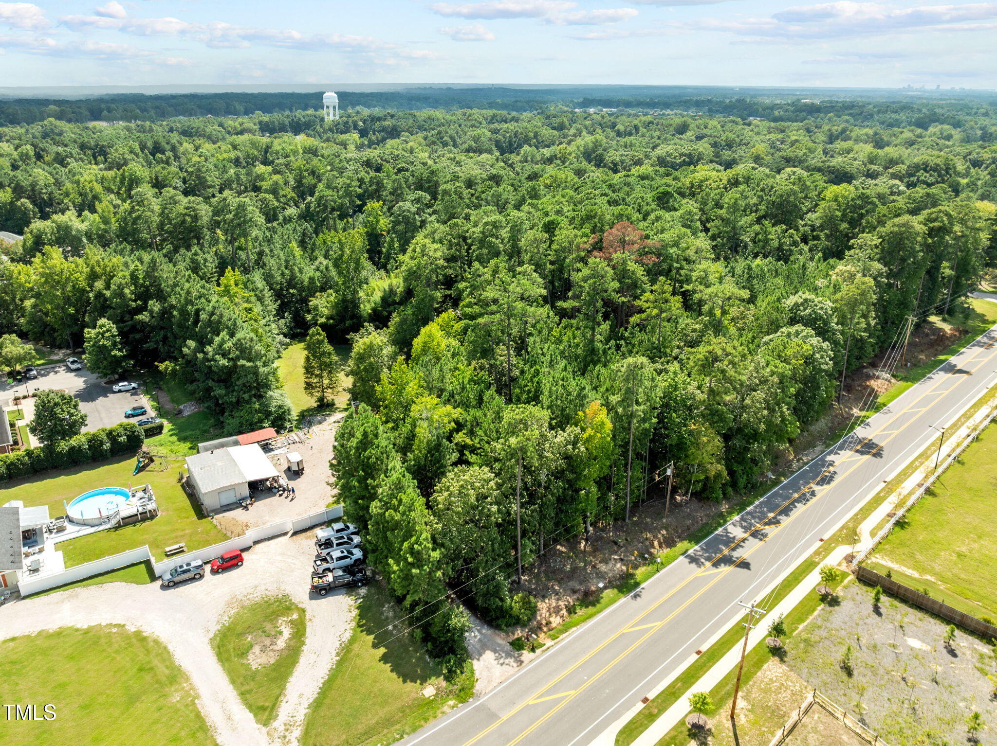 949 Old Knight Road Knightdale, NC 27545 - Photo 18 of 27 a view of a yard with an outdoor seating