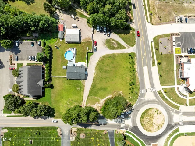 a view of a tree with a yard